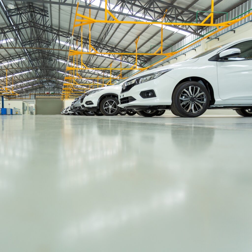 garage epoxy coating with vehicles