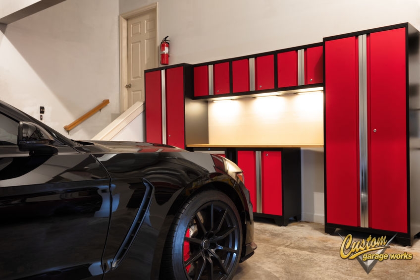 The Interior of a Garage with Red Garage Storage Cabinets.